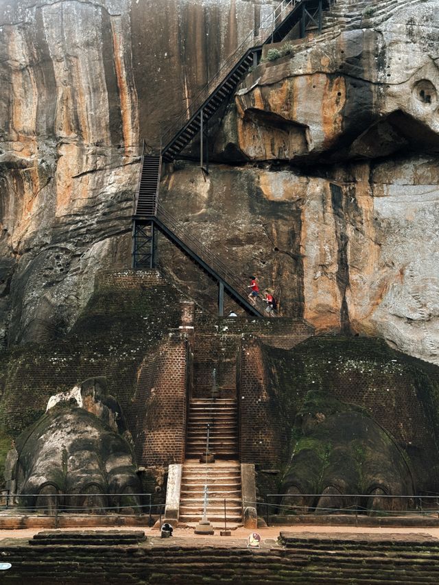 Sigiriya Sri Lanka, the ancient Lion Rock Fortress rising above lush green forests, featuring historic palace ruins and breathtaking panoramic views.