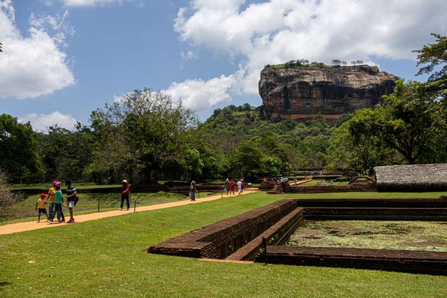Sigiriya Sri Lanka, the ancient Lion Rock Fortress rising above lush green forests, featuring historic palace ruins and breathtaking panoramic views.